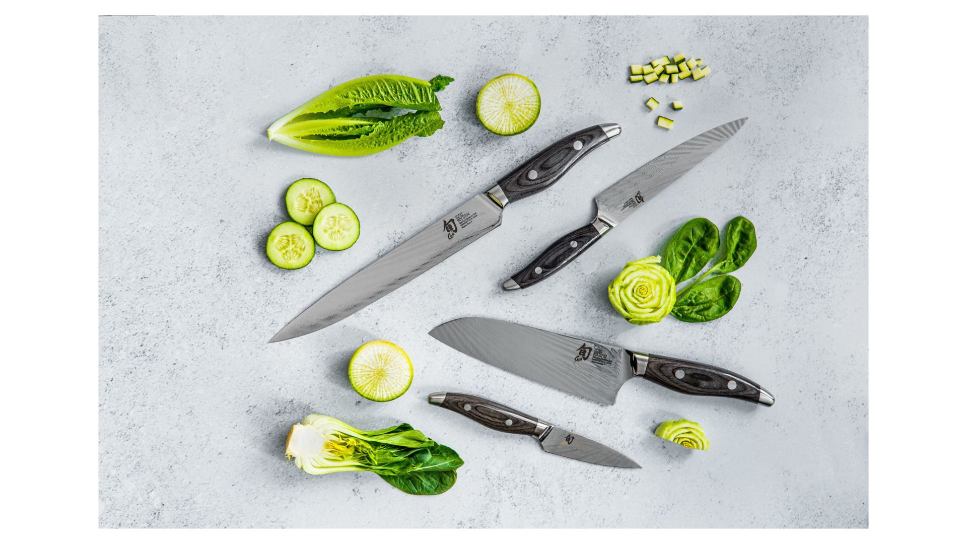 Нож поварской KAI Shun Nagare Santoku NDC-0702